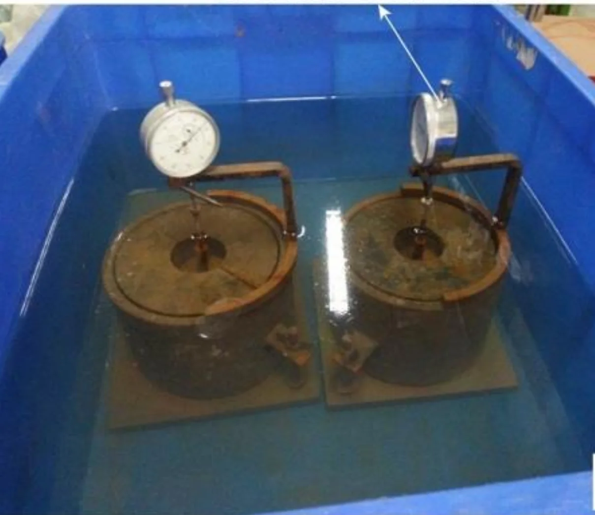 Soil rig in operation with workers