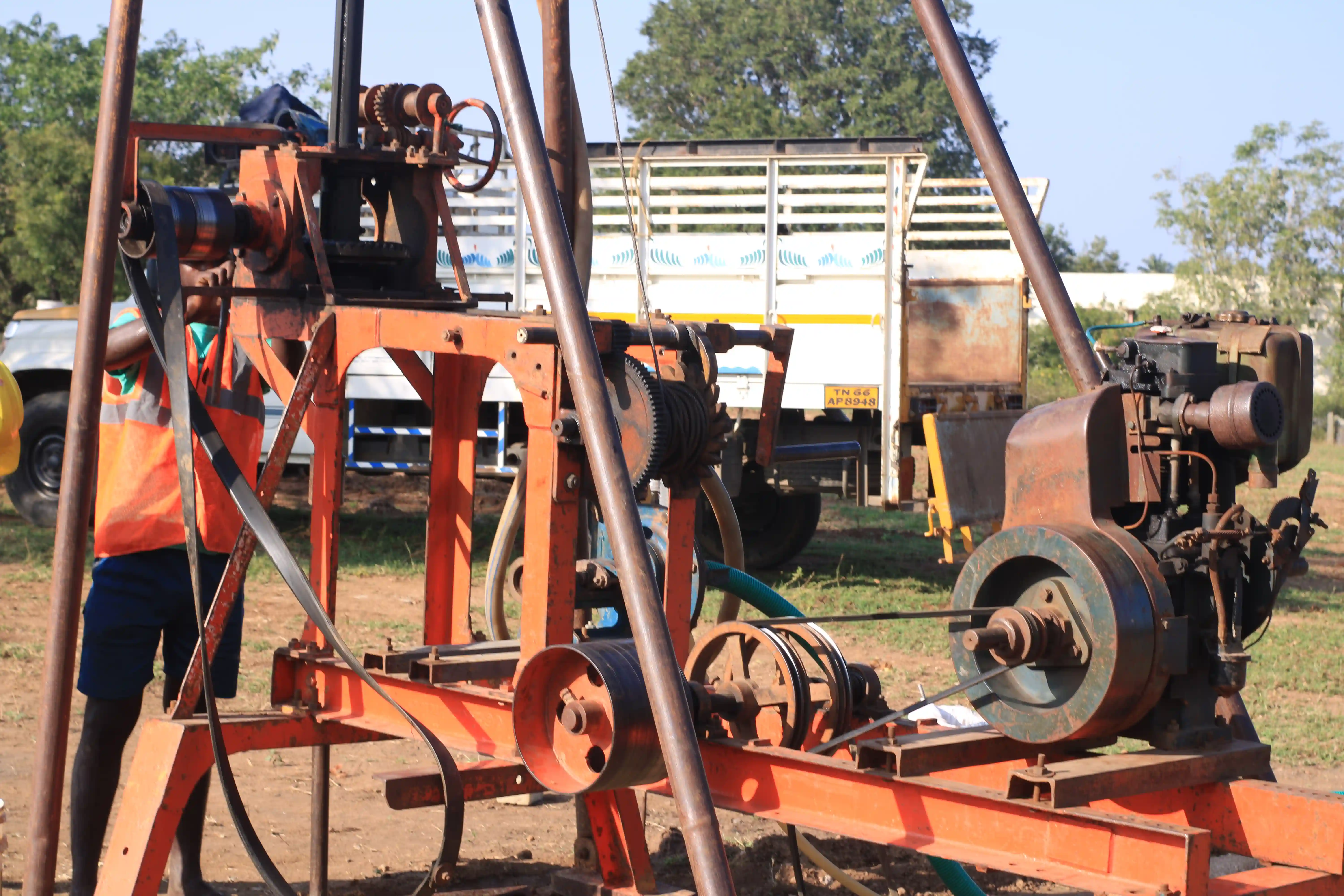 Soil rig in operation with workers