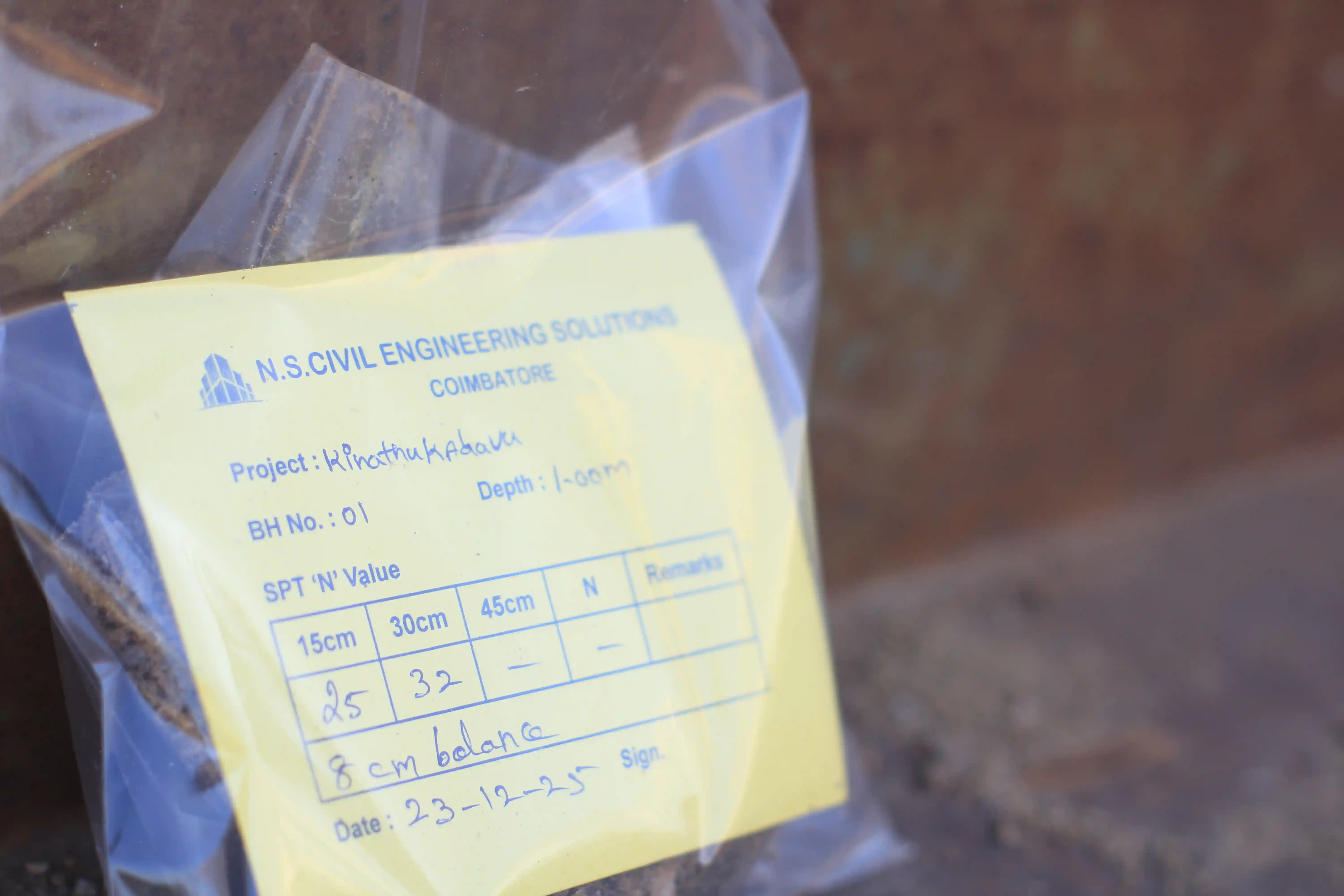 Soil rig in operation with workers