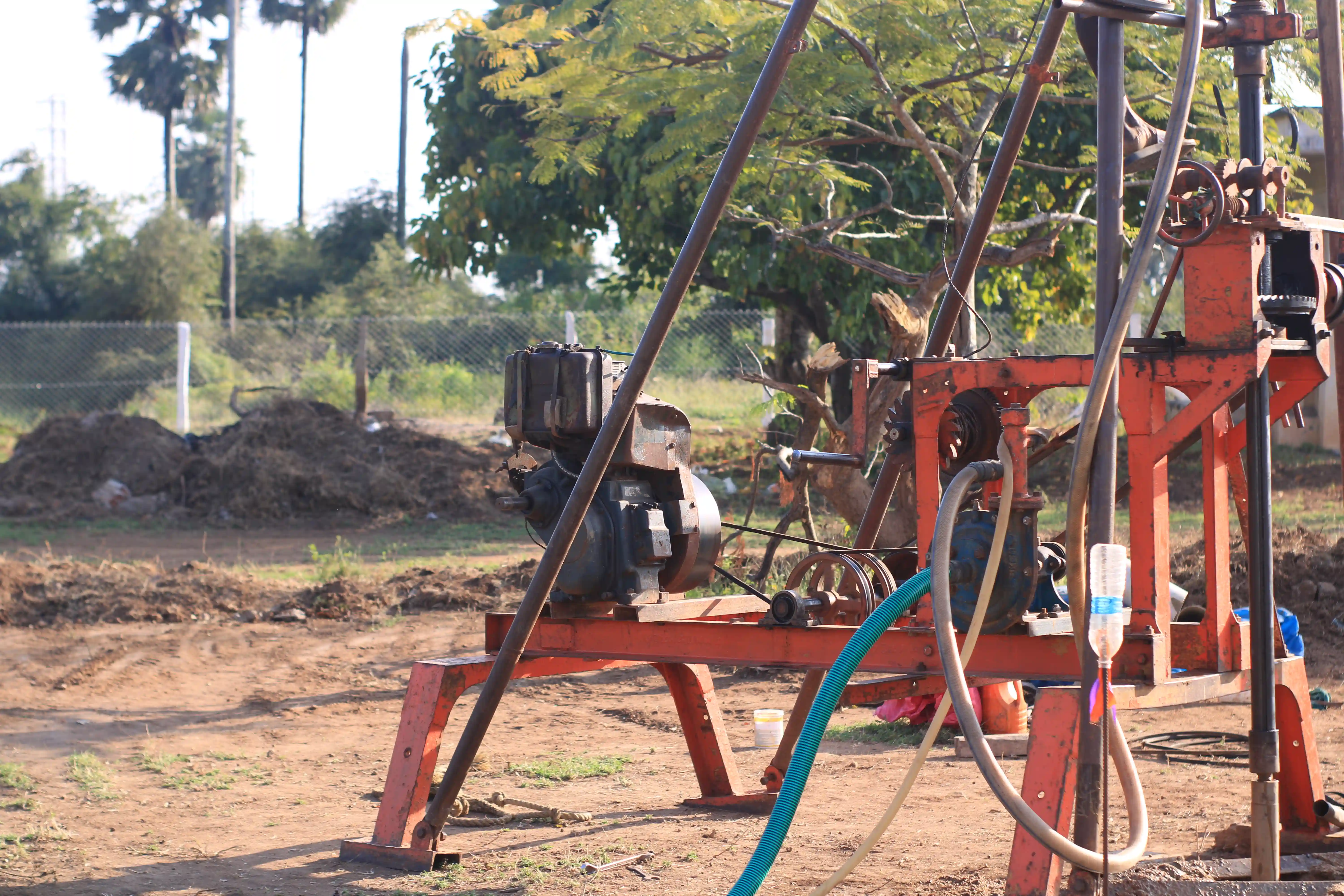 Soil rig in operation with workers