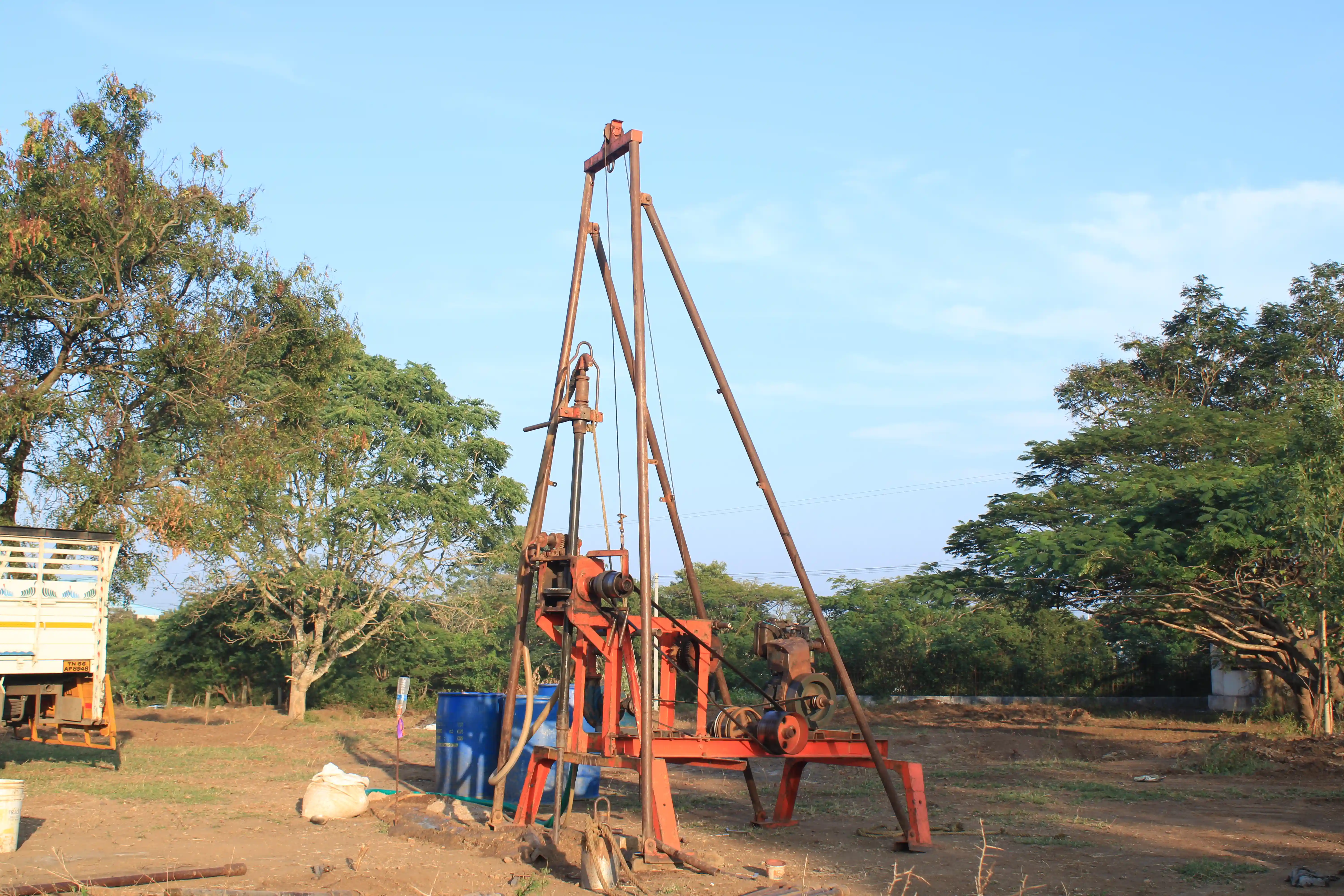 Soil rig at coastal location with palm trees