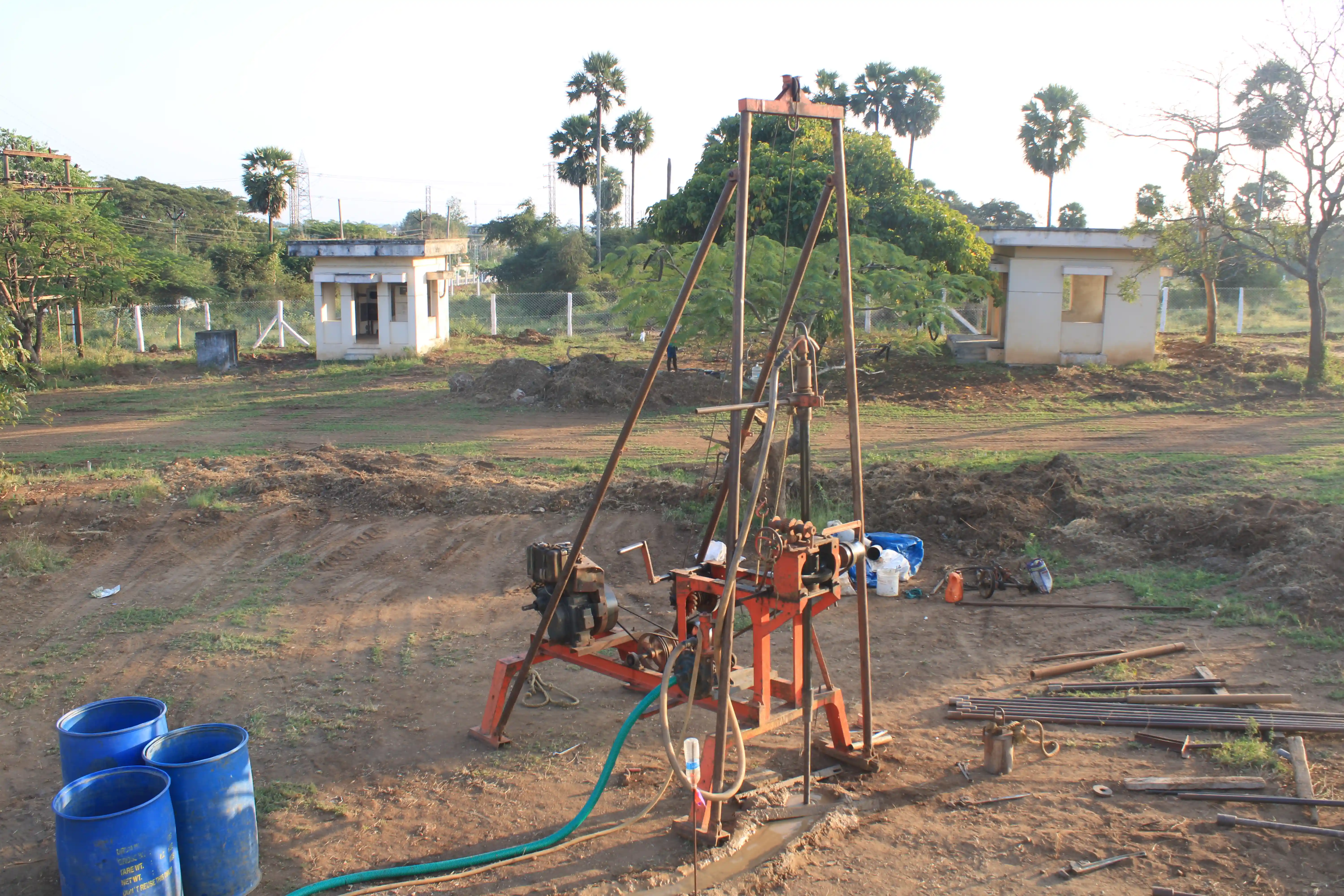Soil rig at coastal location with palm trees