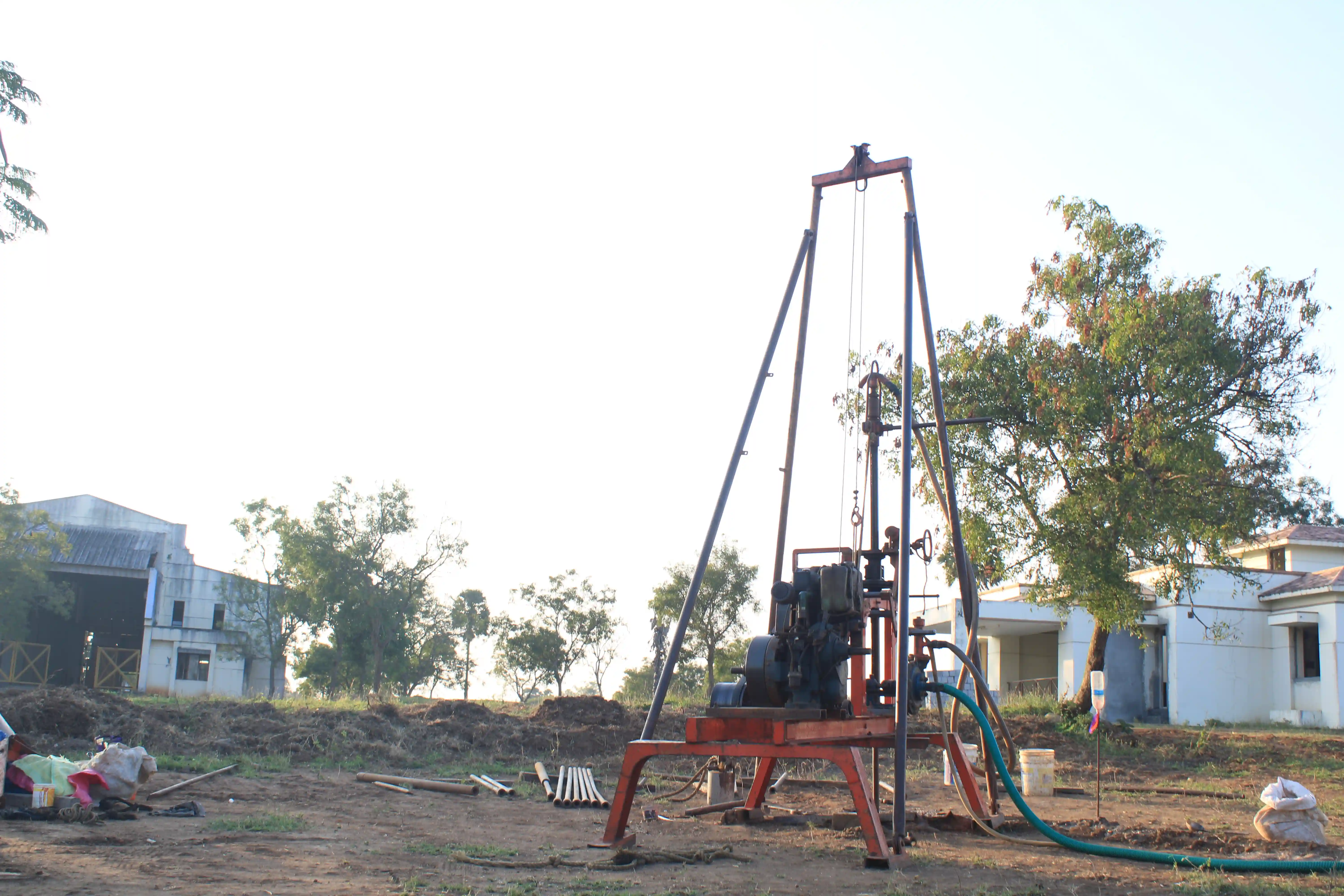 Soil rig at coastal location with palm trees