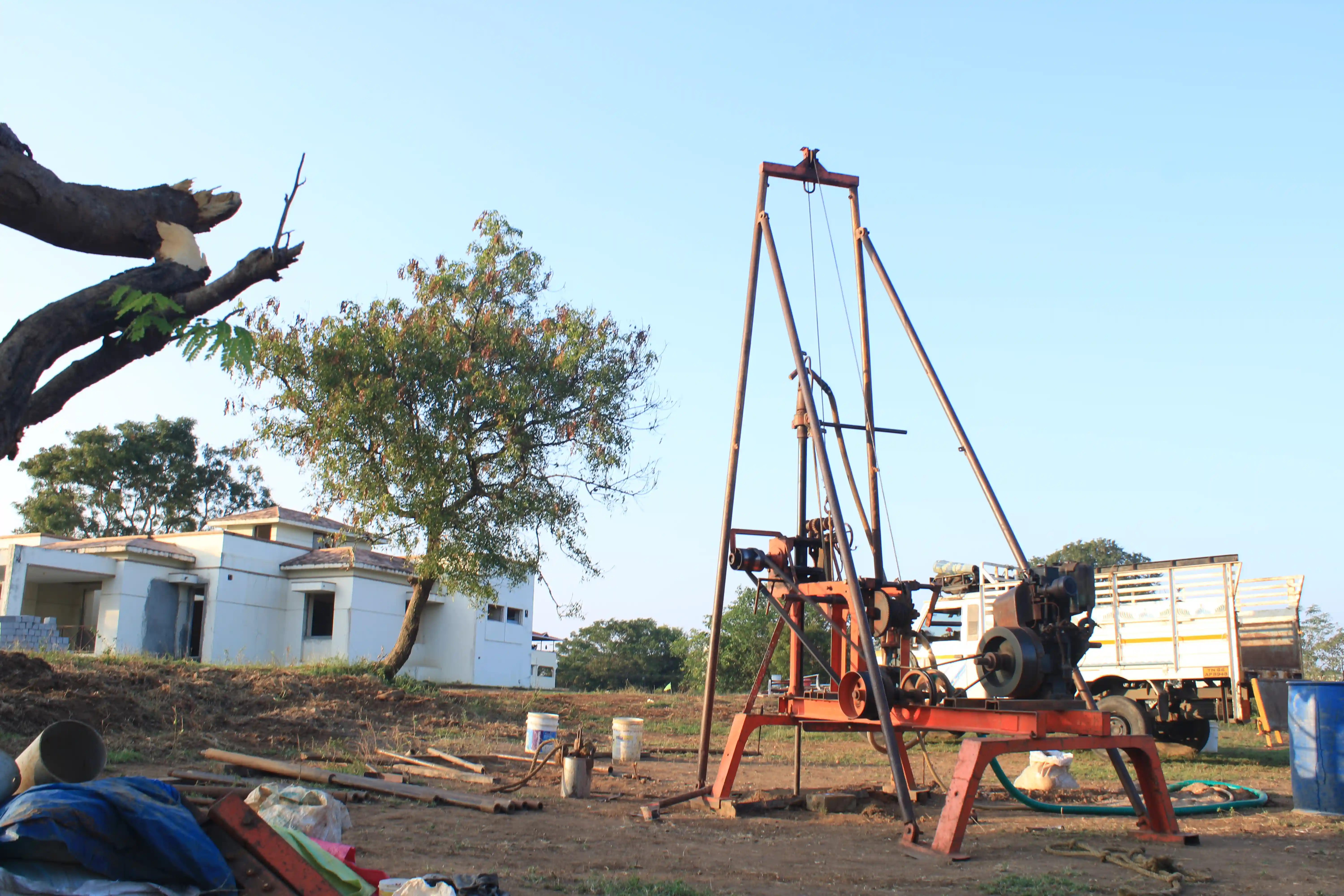 Soil rig in operation with workers