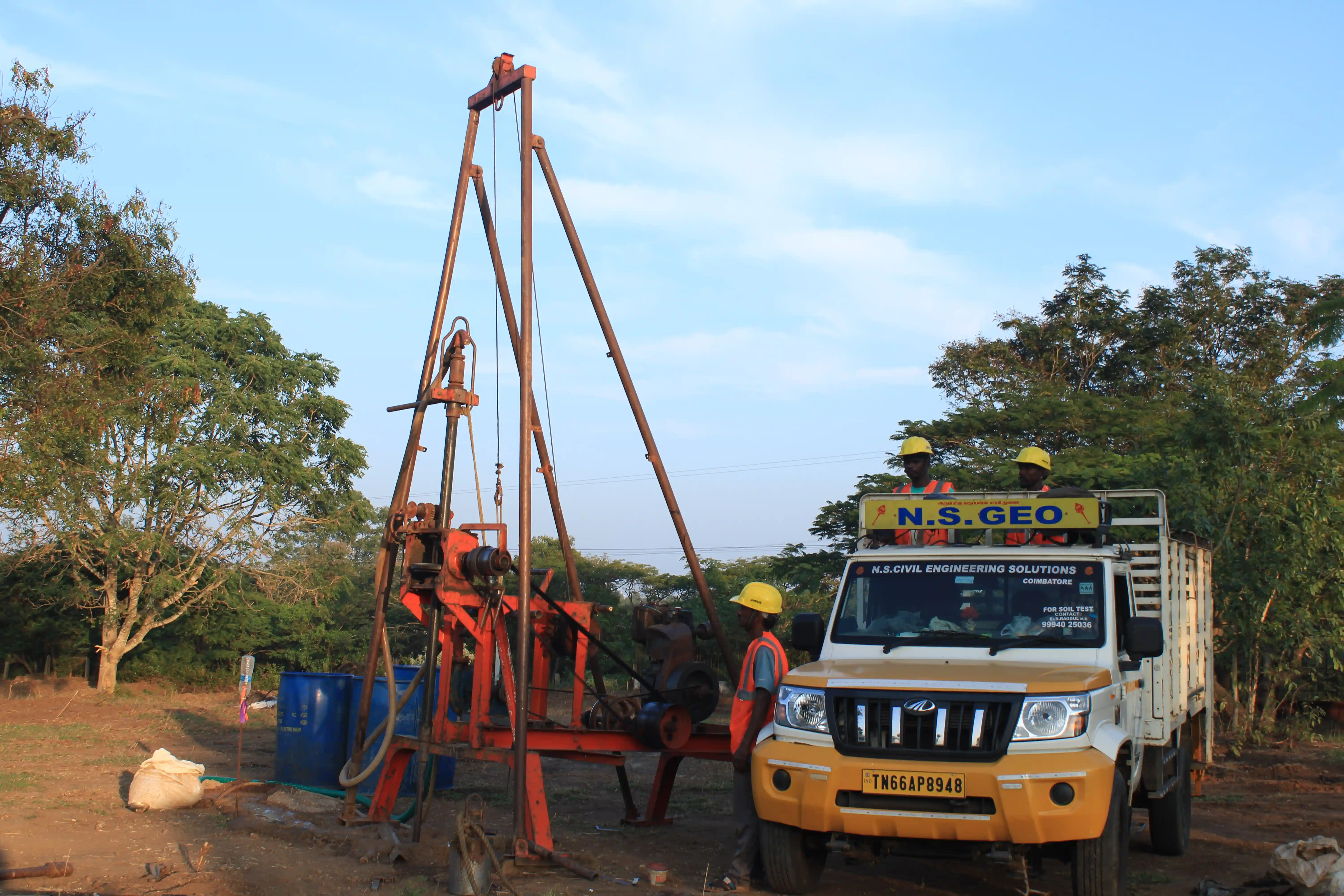Soil rig at coastal location with palm trees