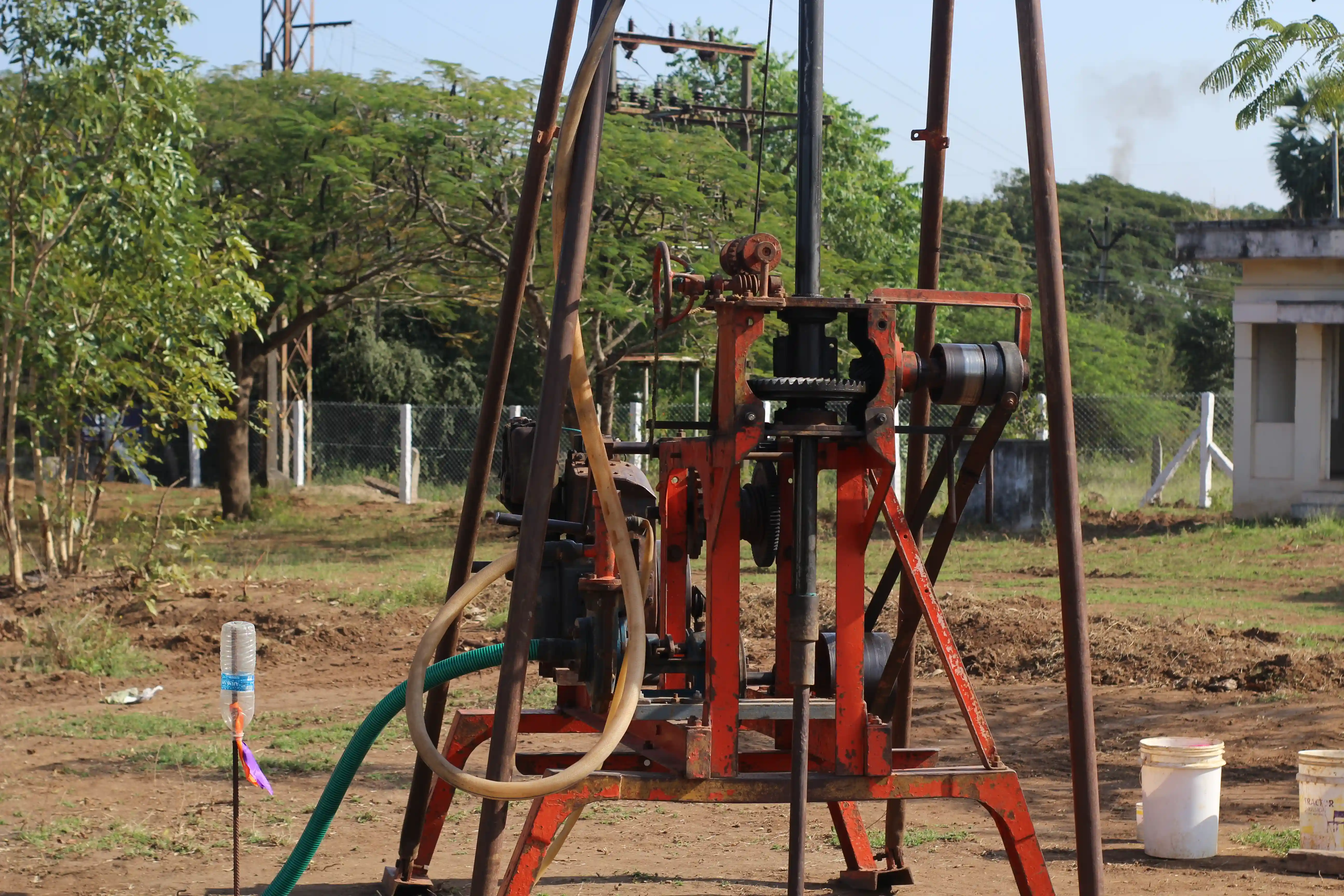 Soil rig at coastal location with palm trees