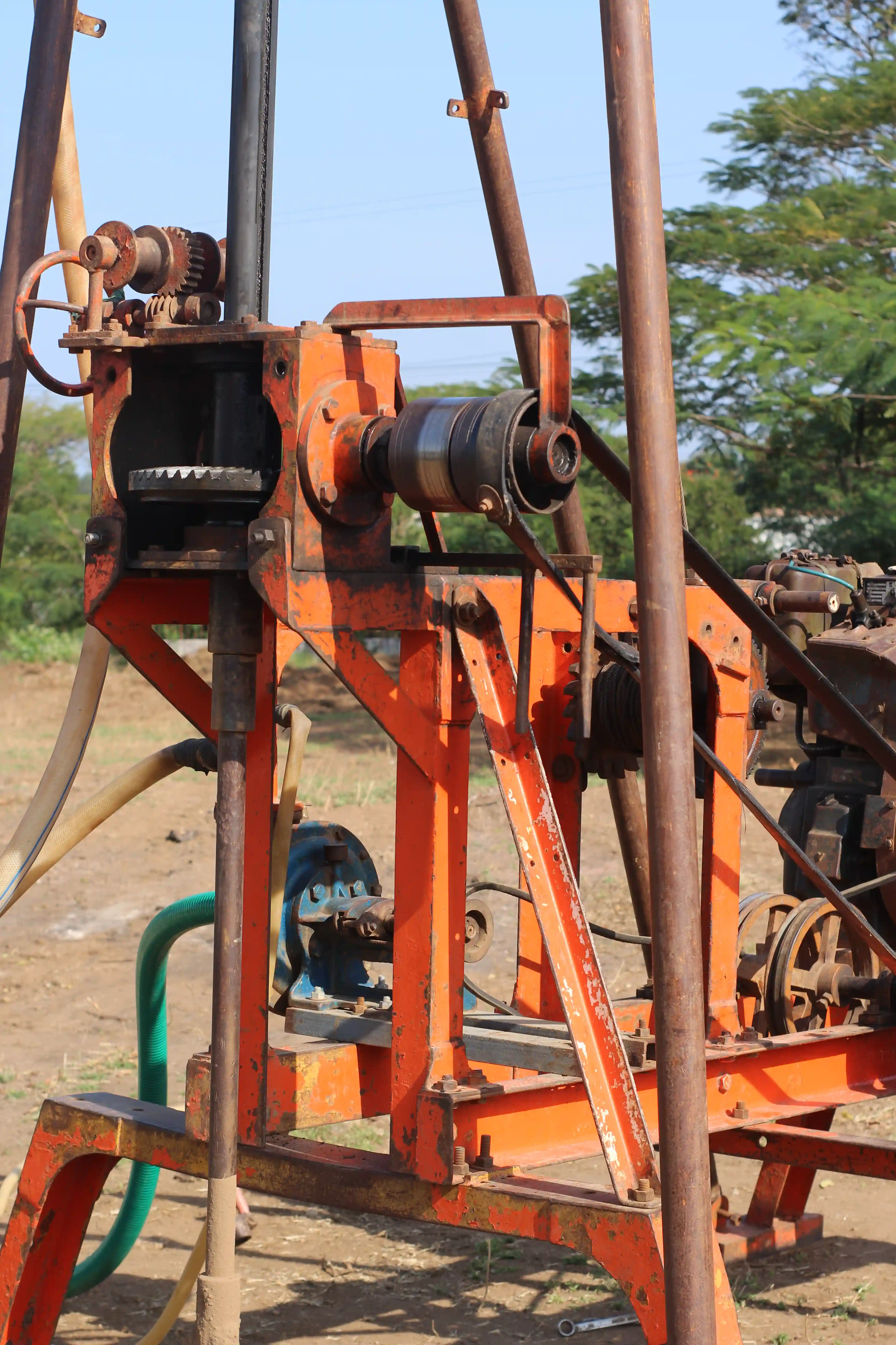 Soil rig in operation with workers